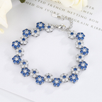 Juego de pulsera y collar de cristal de flor azul con púas