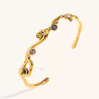 Pulsera de puño de acero de titanio chapada en oro de 18 quilates con circonita cúbica